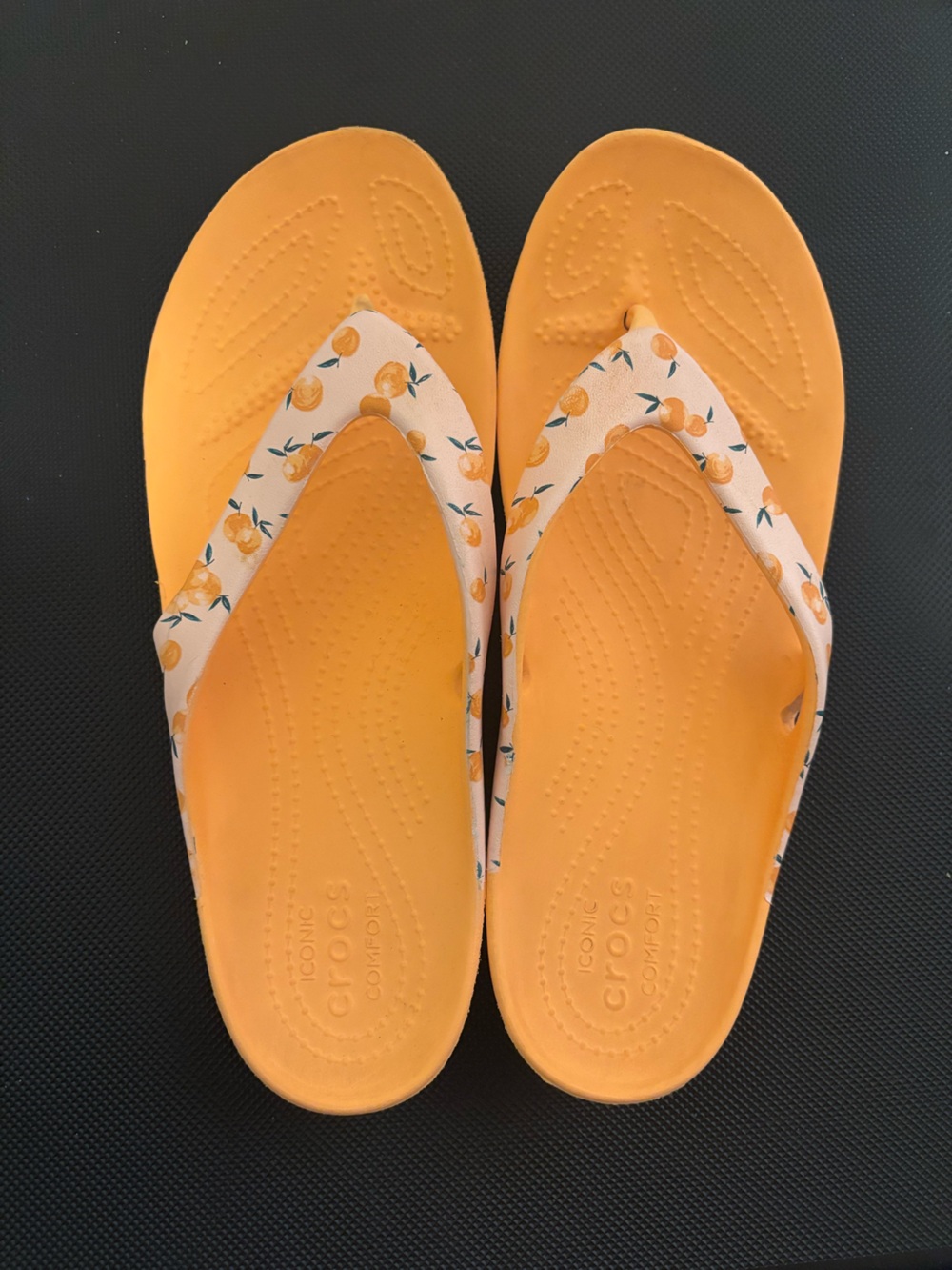 CROCS Women’s Orange Flip Flops with White Citrus-Print Strap